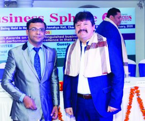 Deepak Khattar Editor presenting a Shawl to H E Mr Juan Cortez Rojas CDA & Head of Mission of the Plurinational