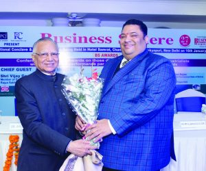 K L Malhotra Advisor presenting a bouquet to H E Mr Ricardo A Berna CDA & Head of Mission of The Republic of Panama